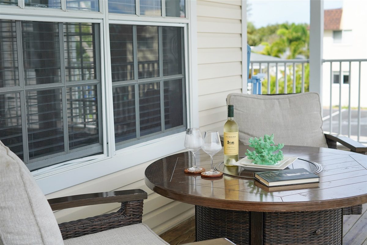 Balcony table for two at Coastal Getaway