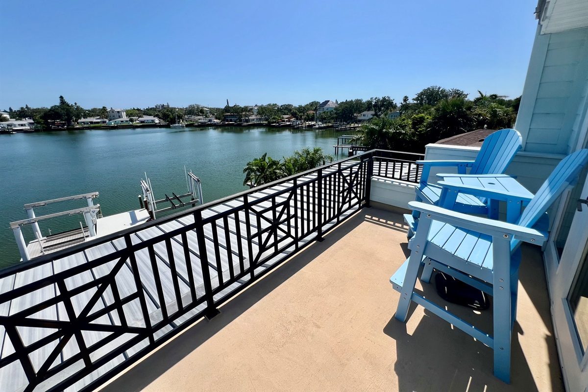 Balcony with Adirondack chairs overlooking the Intracoastal at Coastal Manor