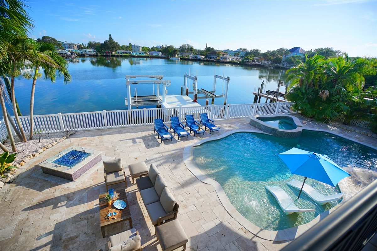 Aerial view of the Coastal Manor pool, spa and dock on the Intracoastal